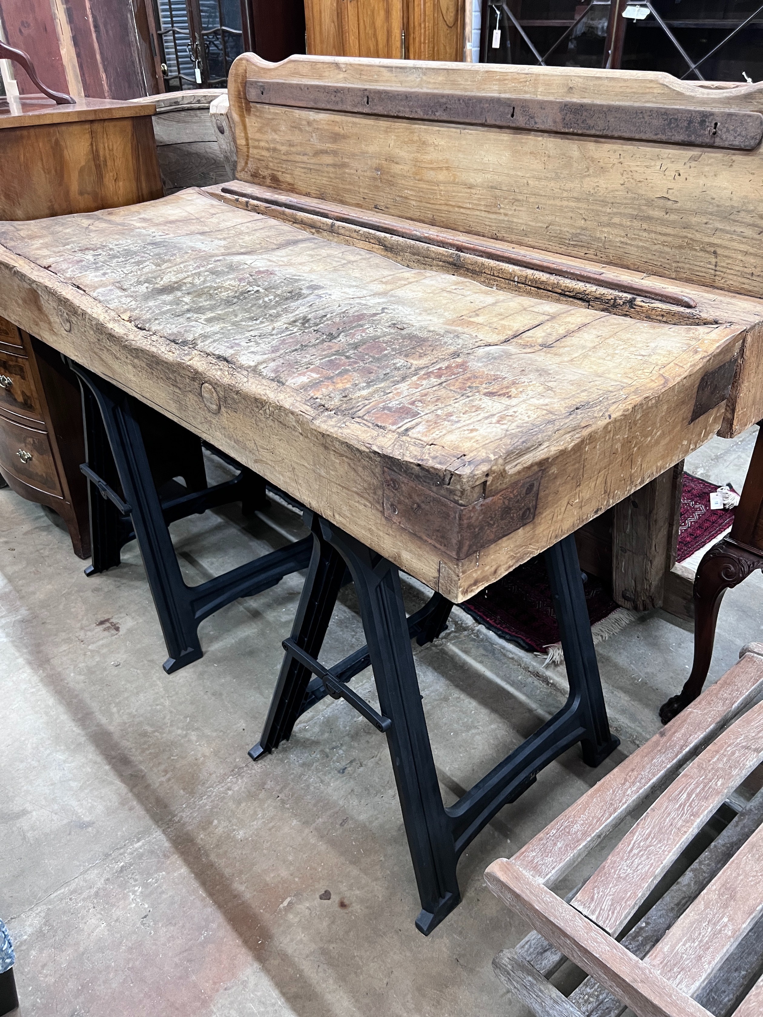 A Victorian butcher's block on modern trestle base, width 162cm, depth 76cm, height 126cm *Please note the sale commences at 9am.